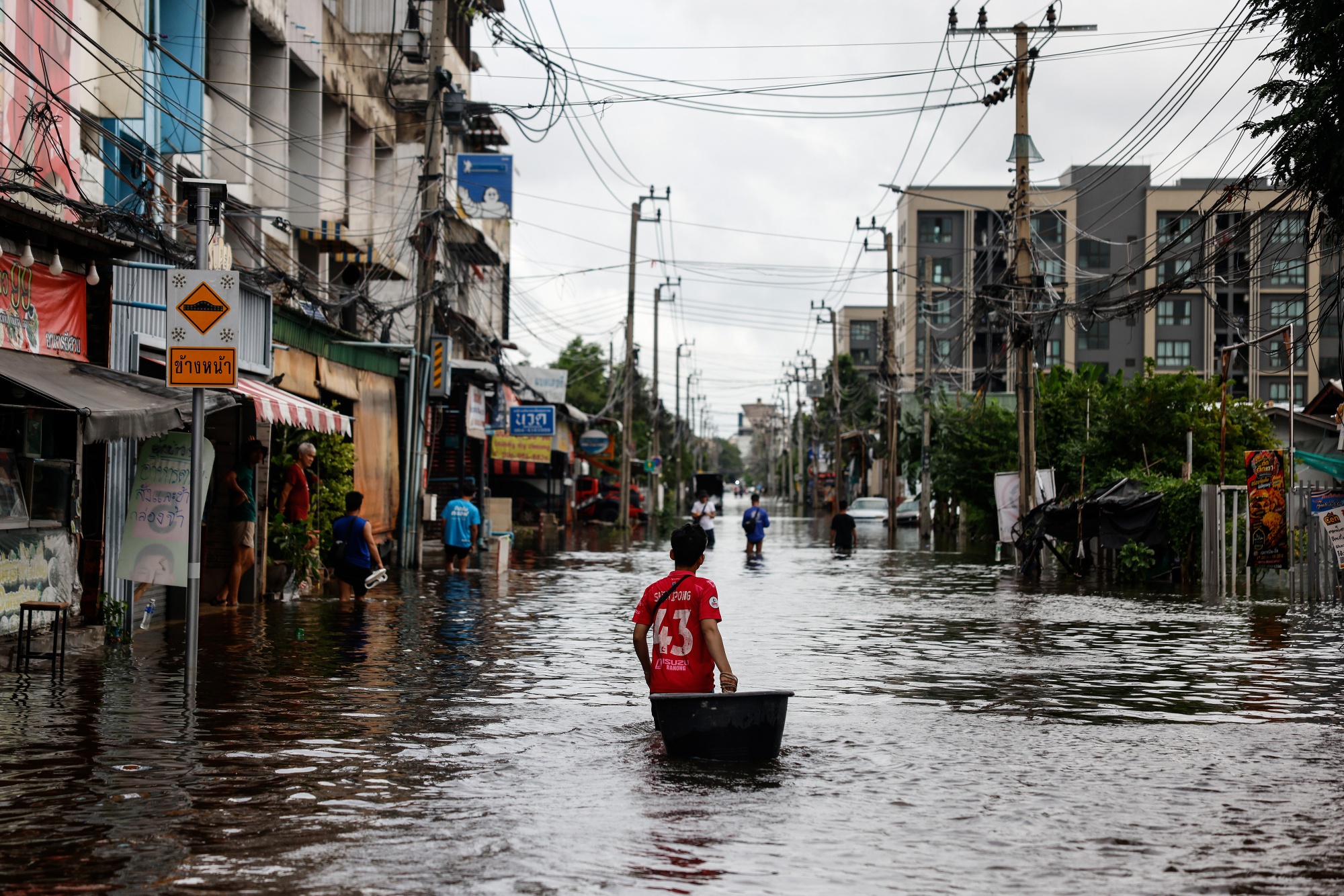 Image associated with story "Thailand Floods Hit Thai Airways, Honda as Disruption Spreads"
