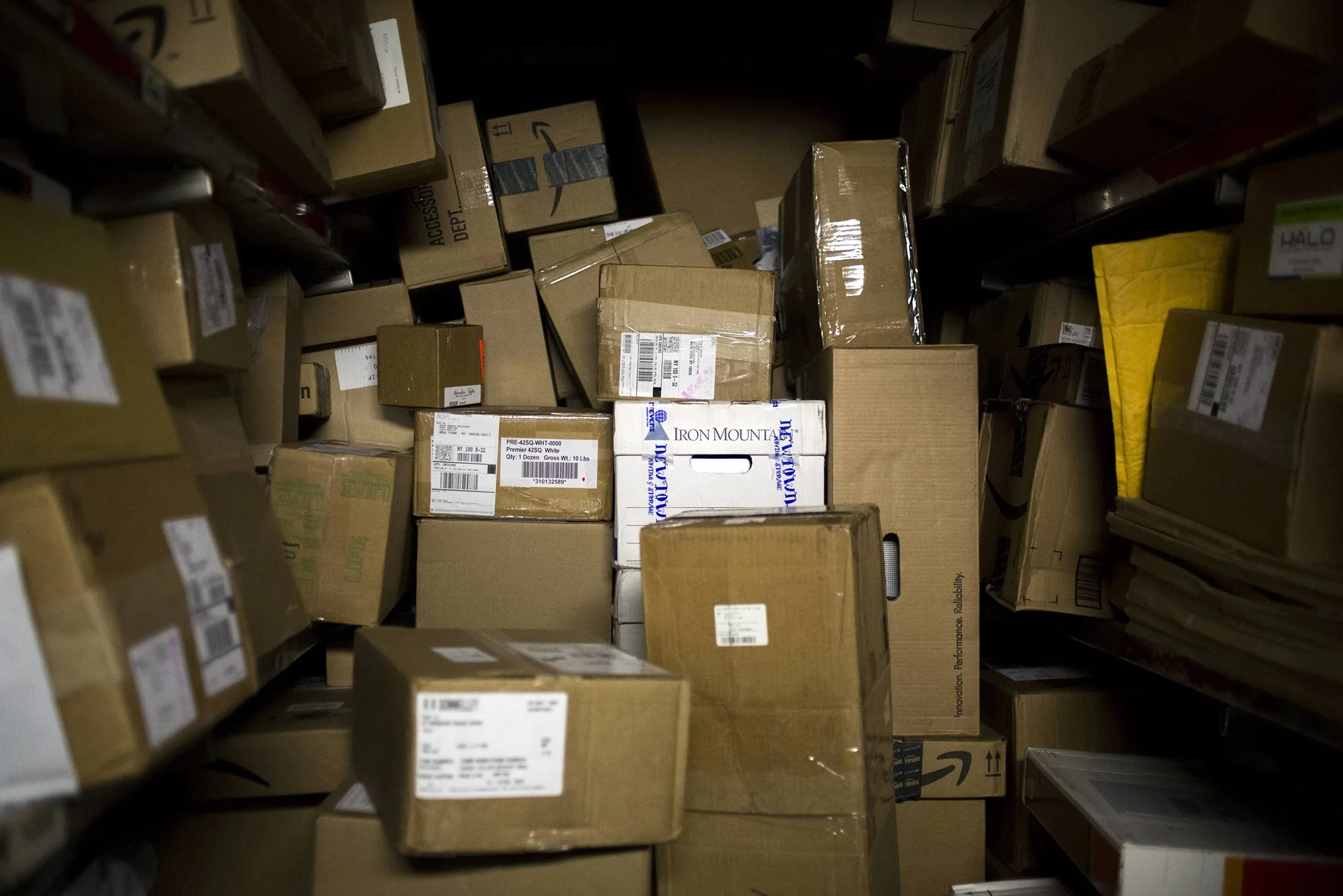 Packages sit stacked in a truck for delivery on Cyber Monday at a United Parcel Service Inc. (UPS) distribution facility in New York.