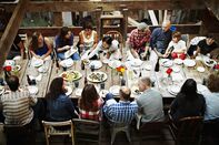 Group of friends and family dining overhead view