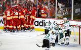 Gaudreau's OT Goal Gives Flames 3-2 Win Over Stars in Game 7