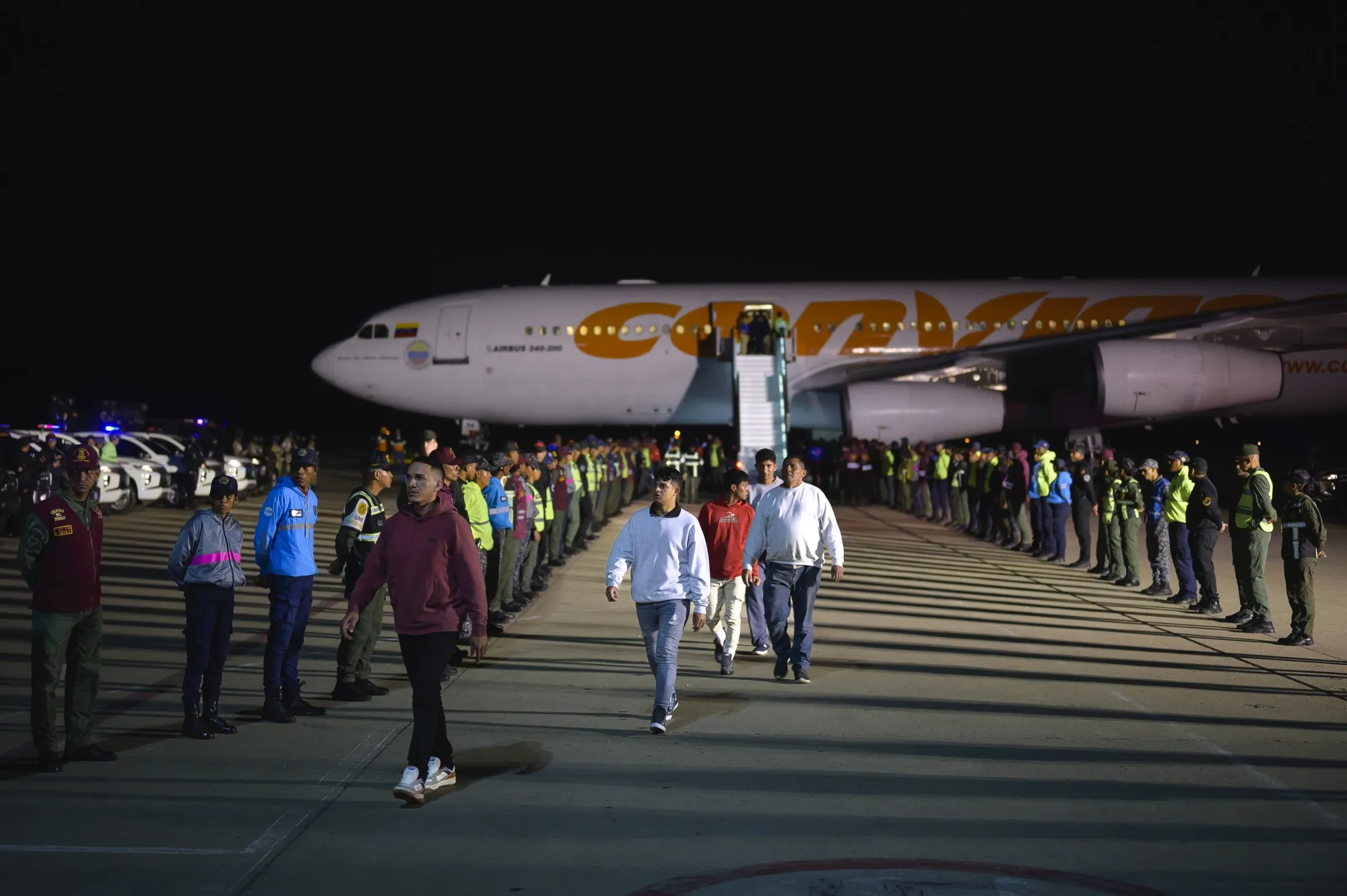 Deported individuals from the US arrive on a flight at Simon Bolivar International Airport&nbsp;in Maiquetia, Vargas state, Venezuela on March 24.