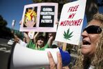 A California resident protesting law enforcement actions against medical marijuana outside the federal courthouse in Sacramento, California in 2011.