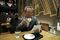 Sadao Sekine drinks a cup of coffee at a cafe bar in Saitama, Japan. Photographer: Kiyoshi Ota/Bloomberg