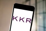 In this photo illustration the KKR logo is  seen displayed