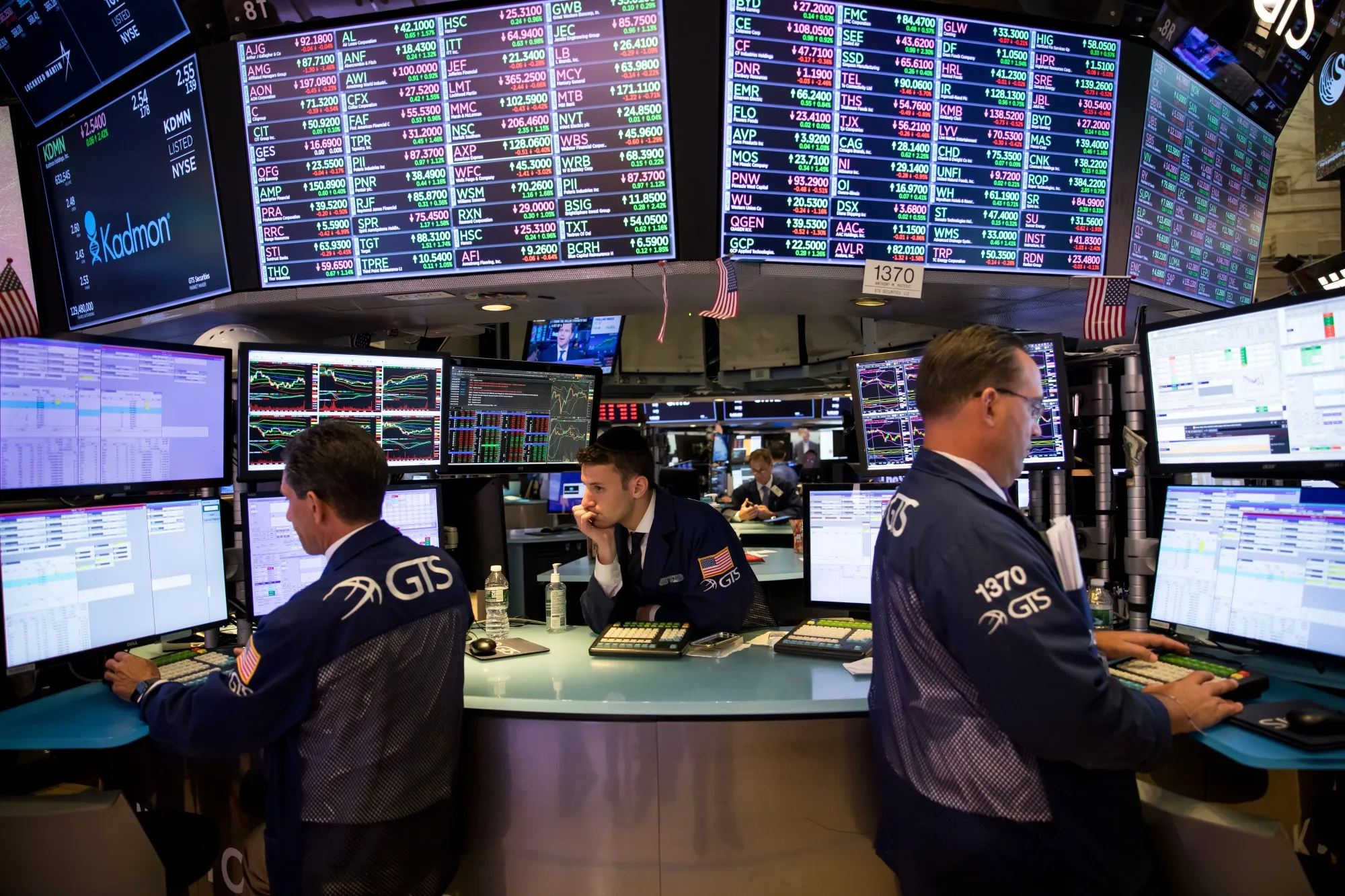 Traders work on the floor of the New York Stock Exchange.