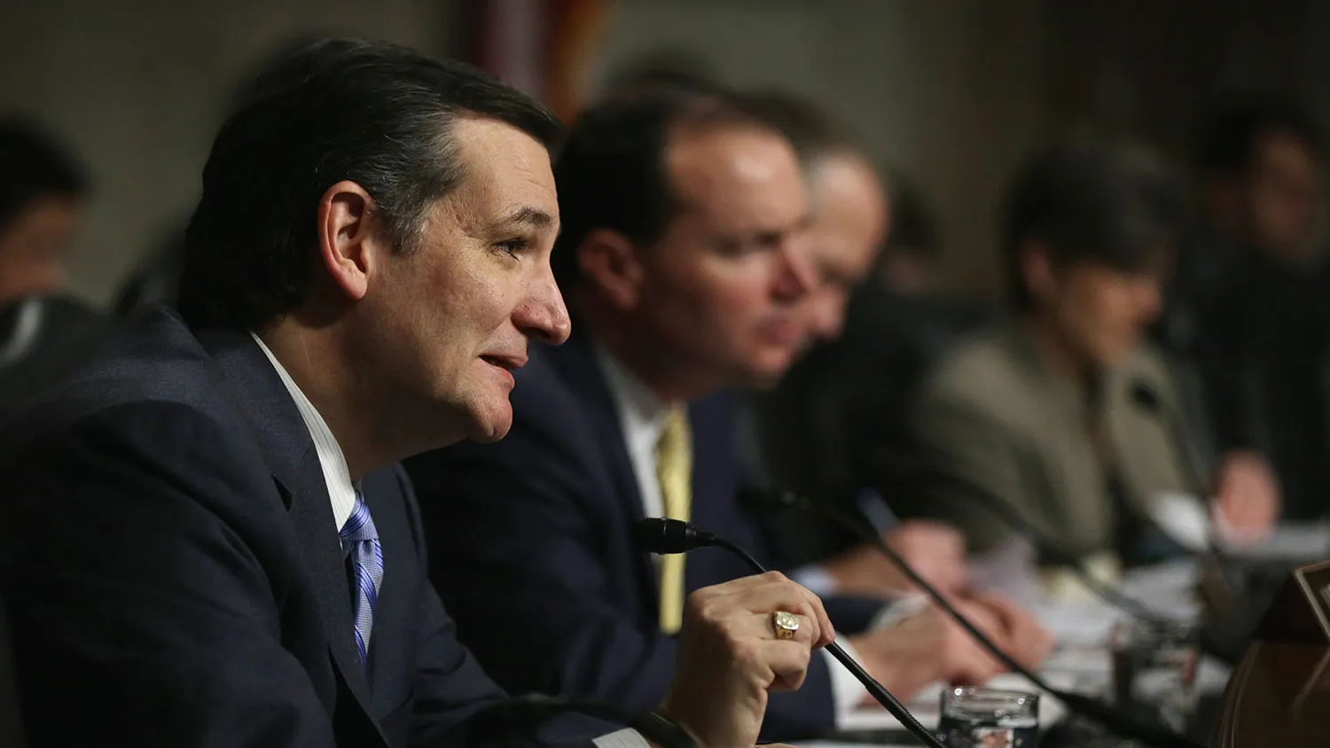 U.S. Sen. Ted Cruz (R-TX) (L) speaks during a confirmation hearing for former U.S. Deputy Secretary of Defense Ashton Carter before the Senate Armed Services Committee February 4, 2015 on Capitol Hill in Washington, DC.
