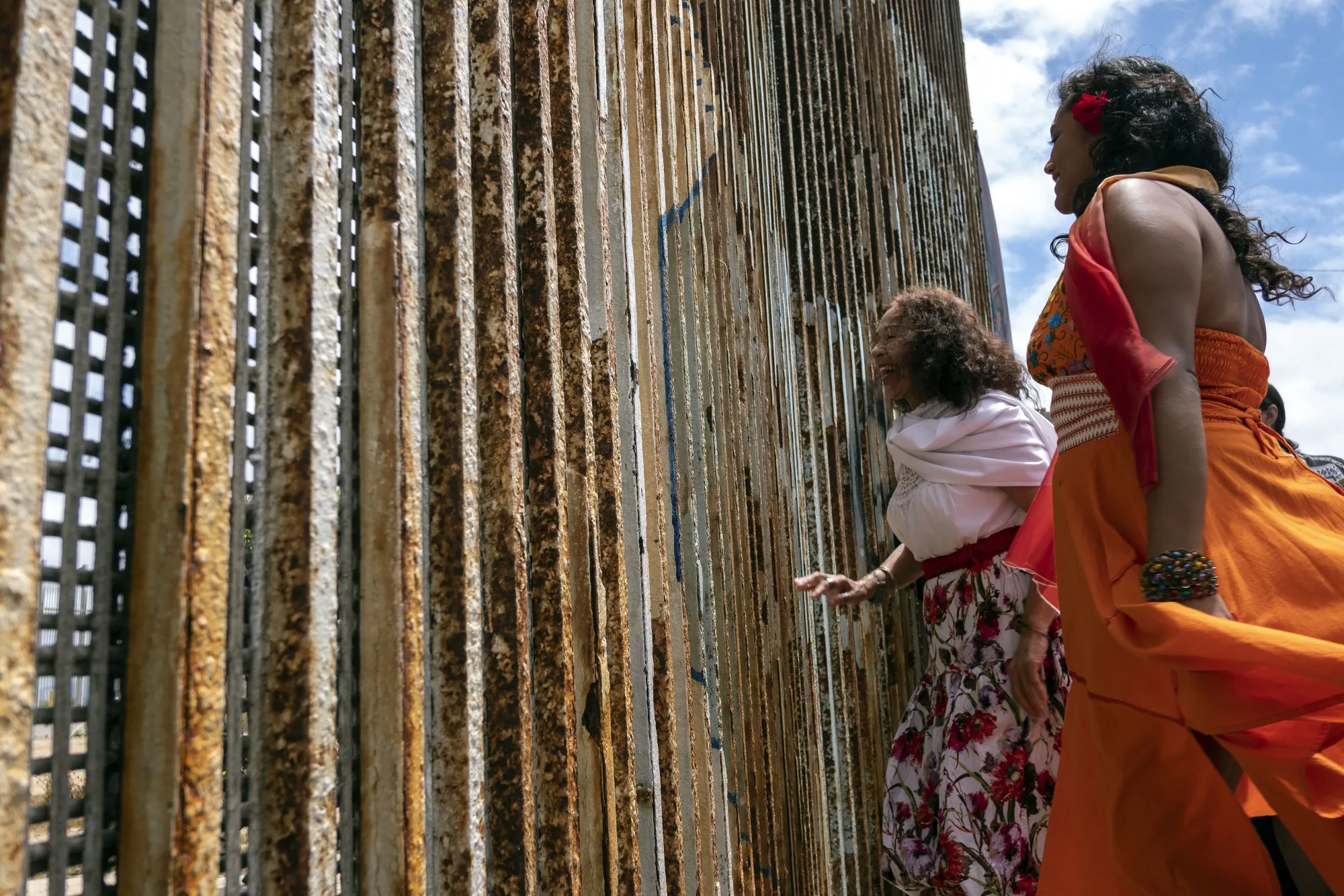 Dancers approach the border fence&nbsp;during the annual “Fandango Fronterizo”&nbsp;at the Friendship Park in&nbsp;2018. During this annual event, musicians gather on both sides of the fence playing and dancing the “Son Jarocho,”&nbsp;a regional folk music style from rural Veracruz.&nbsp;