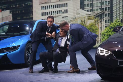 Harald Krueger assisted to his feet at Frankfurt Motor show