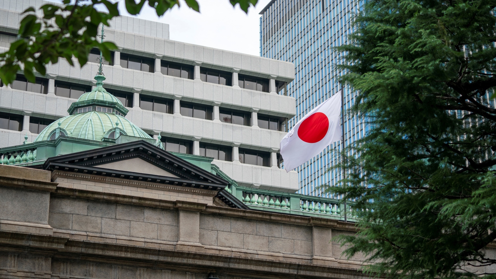 Bank of Japan Hikes Interest Rate, Unveils Plan to Cut Back Bond Buying -  Bloomberg