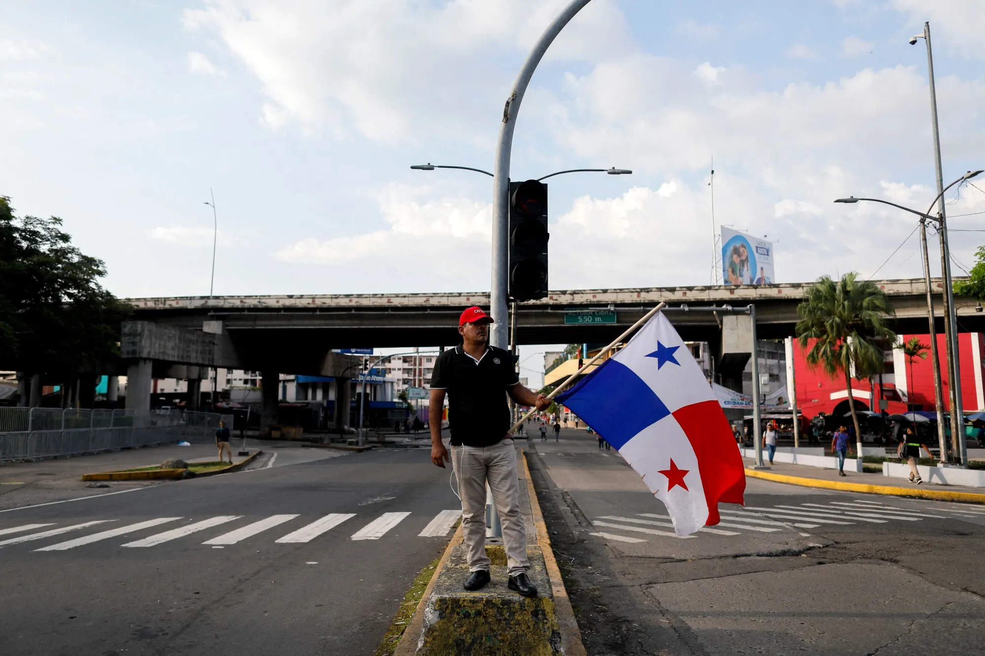 A demonstrator&nbsp;takes part in a protest against a mining contract in Panama City.