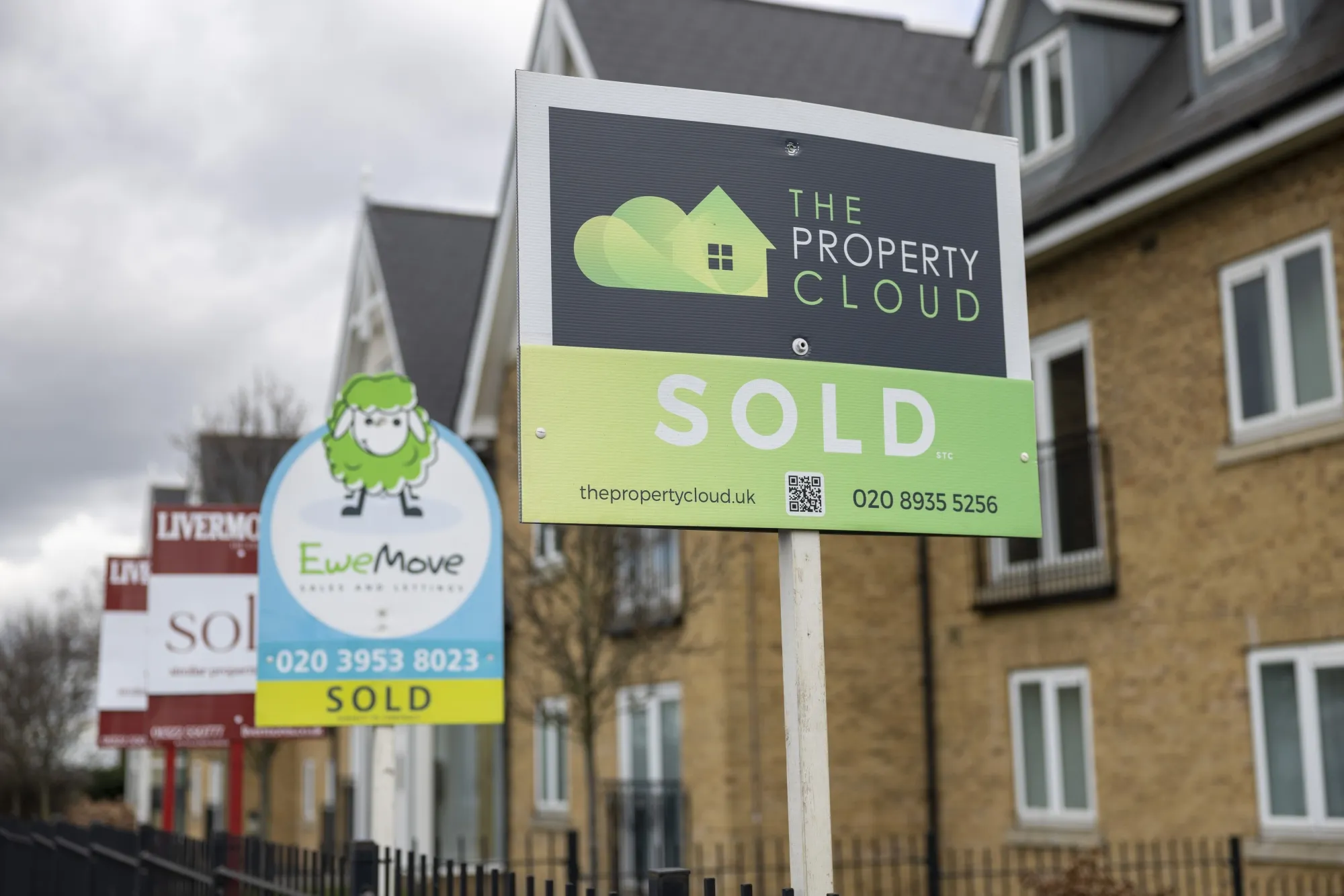 "Sold" signs outside homes in the Slade Green district of Greater London.