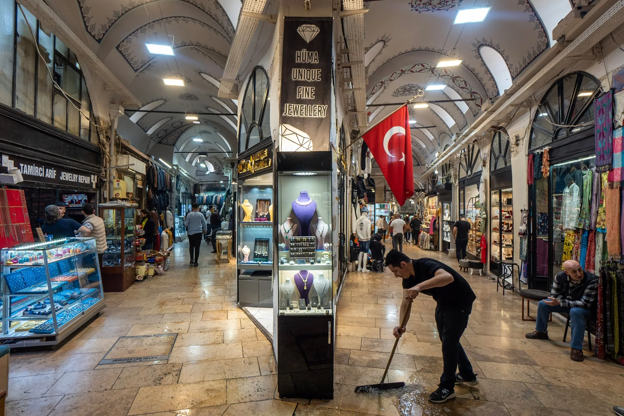 A vendor sweeps outside his store in the Great Bazaar in Istanbul, Turkey.