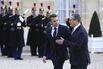 Emmanuel Macron greets Keir Stammer in Paris on Feb. 17.