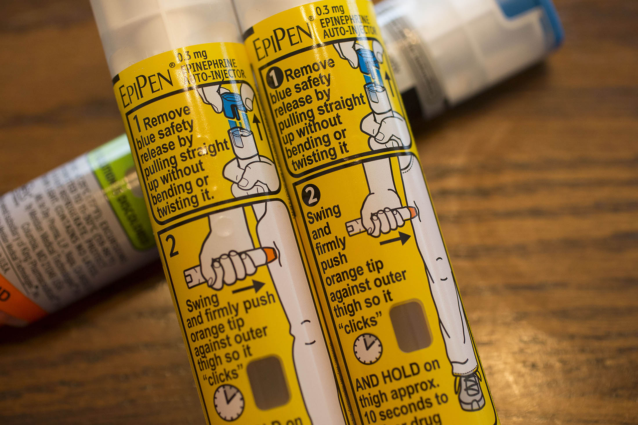 Mylan NV's EpiPen allergy shots sit on display for a photograph in Princeton, Illinois, U.S., on Friday, Aug. 26, 2016. In response to intense criticism over the past few days, Mylan NV moved Thursday to expand assistance programs that help patients with high out-of-pocket expenses -- but didn't go as far as cutting the treatment's list price. Health insurers and U.S. lawmakers criticized the effort as an attempt to cover a 400 percent price hike that won't make the drug more affordable.
