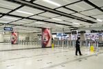 A worker walks through a hall at Lok Ma Chau Station, on the border with China, in Hong Kong, on Feb. 3.