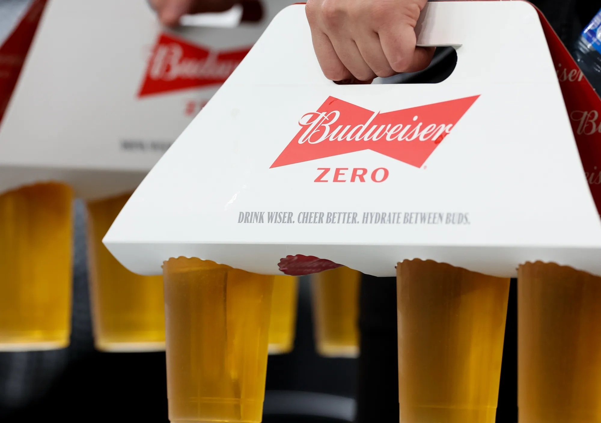 Fans carry Budweiser Zero during the 2022 FIFA World Cup Qatar.