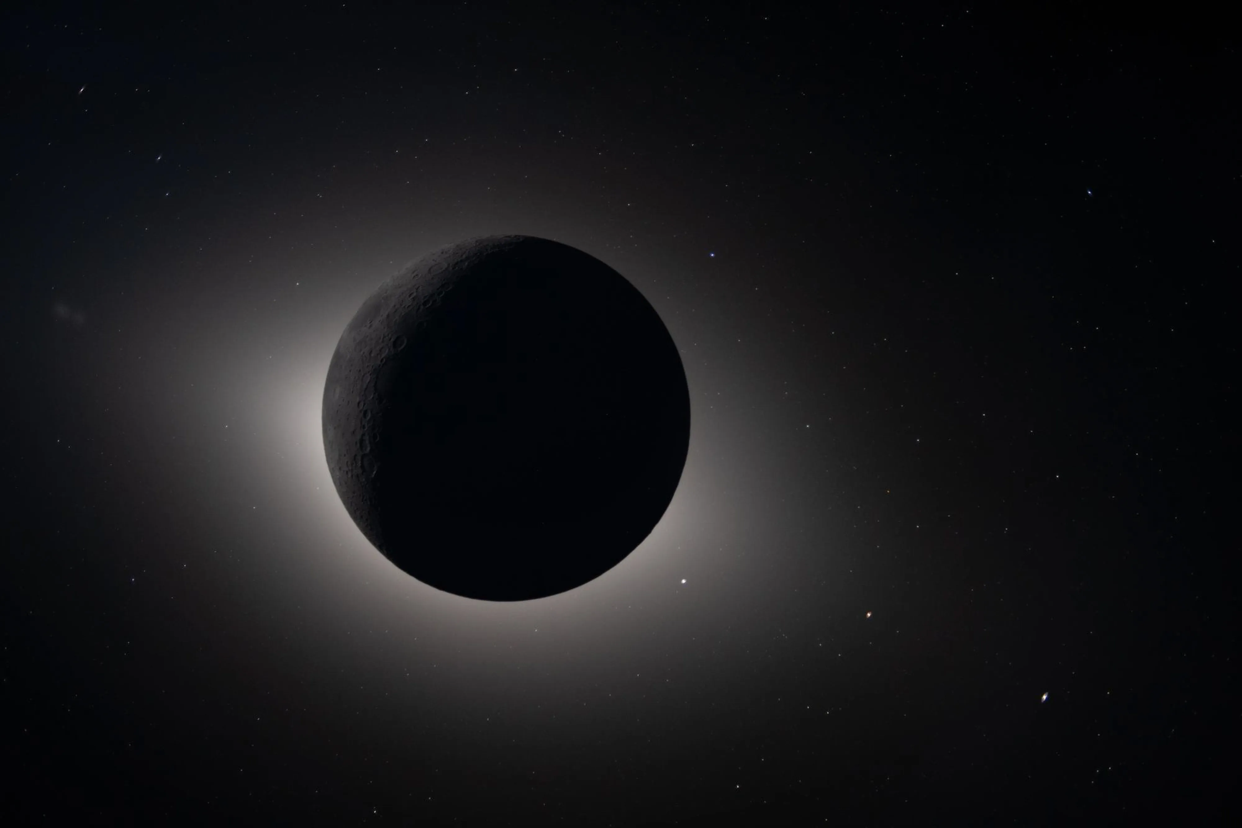 Captured by the Artemis II crew during their lunar flyby on April 6, this image shows the moon fully eclipsing the Sun.