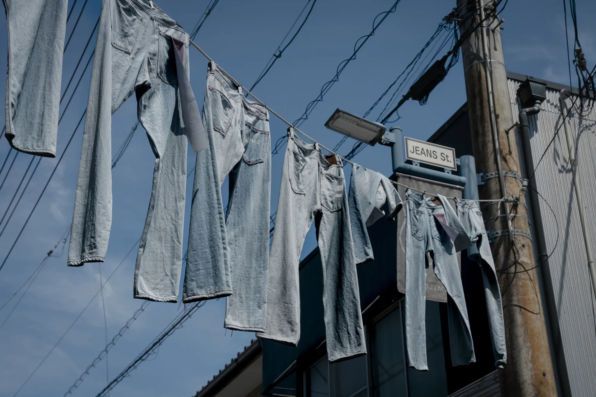 Denim hanging over&nbsp;Jeans Street in Okayama prefecture, home to Japan’s top denim manufacturers and stores.