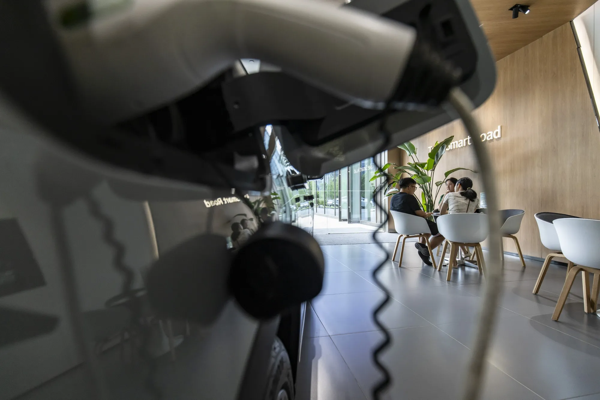 Customers at the Zhejiang Leapmotor Technology Co. showroom in Hangzhou, China.