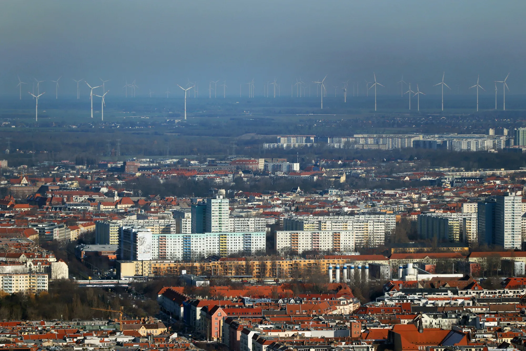 Wind turbines beyond the Prenzlauer Berg and Weissensee districts in Berlin.