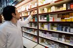 A&nbsp;man works at a drugstore at the Nikan hospital in Tehran on Sept.&nbsp;11.&nbsp;
