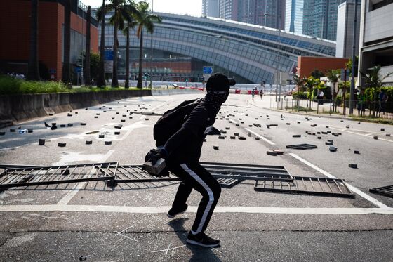 Hong Kong’s Lam to Visit Japan as Protest Violence Continues