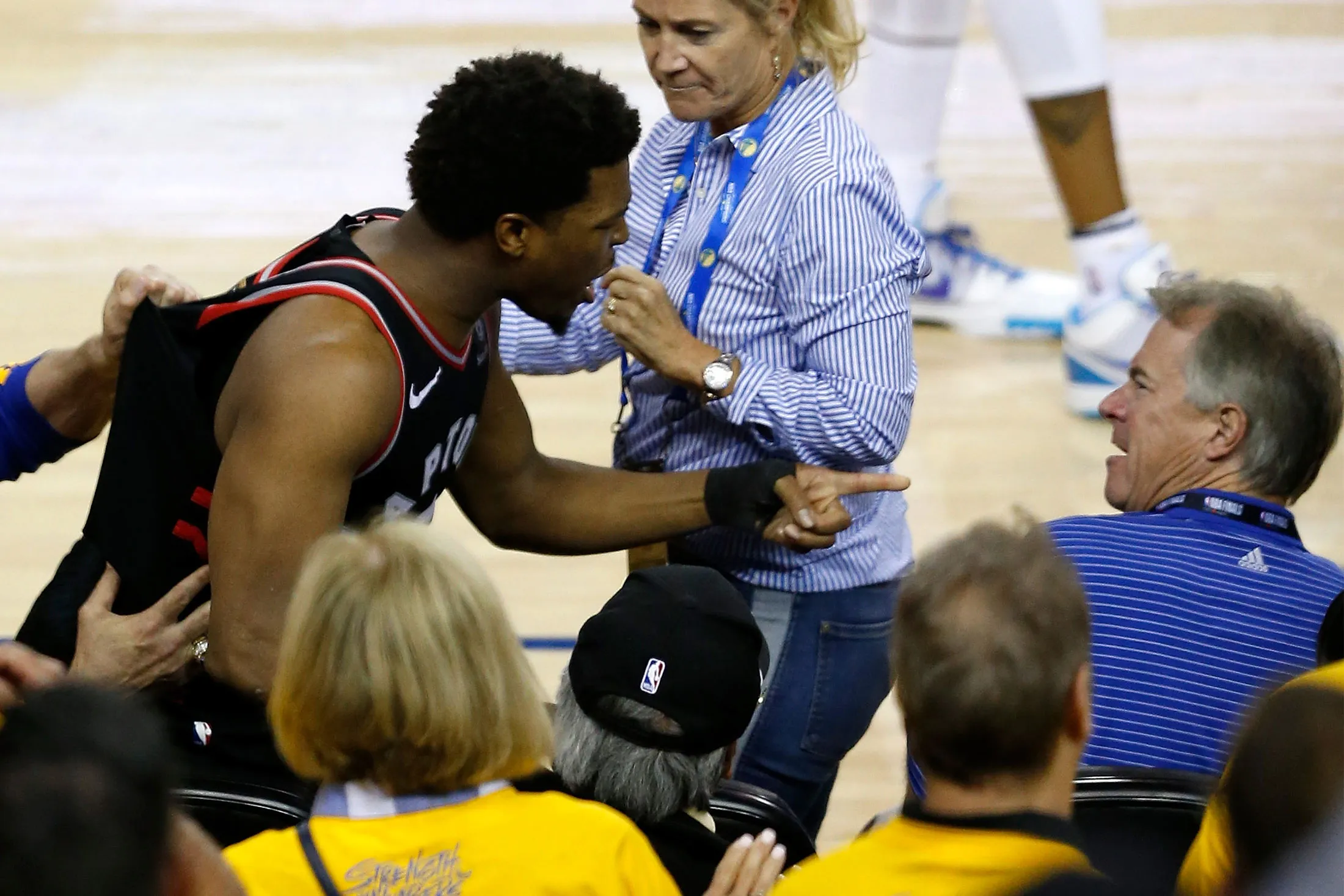 Kyle Lowry, left, argues with Mark Stevens on June 5.