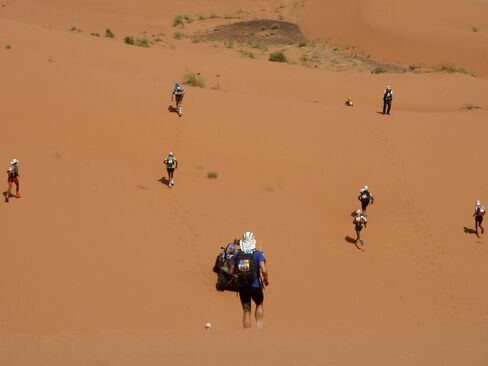 The race leaders pick their way through sand dunes near the end of the 42-kilometer marathon stage – the fifth and final competitive leg of the Marathon des Sables.