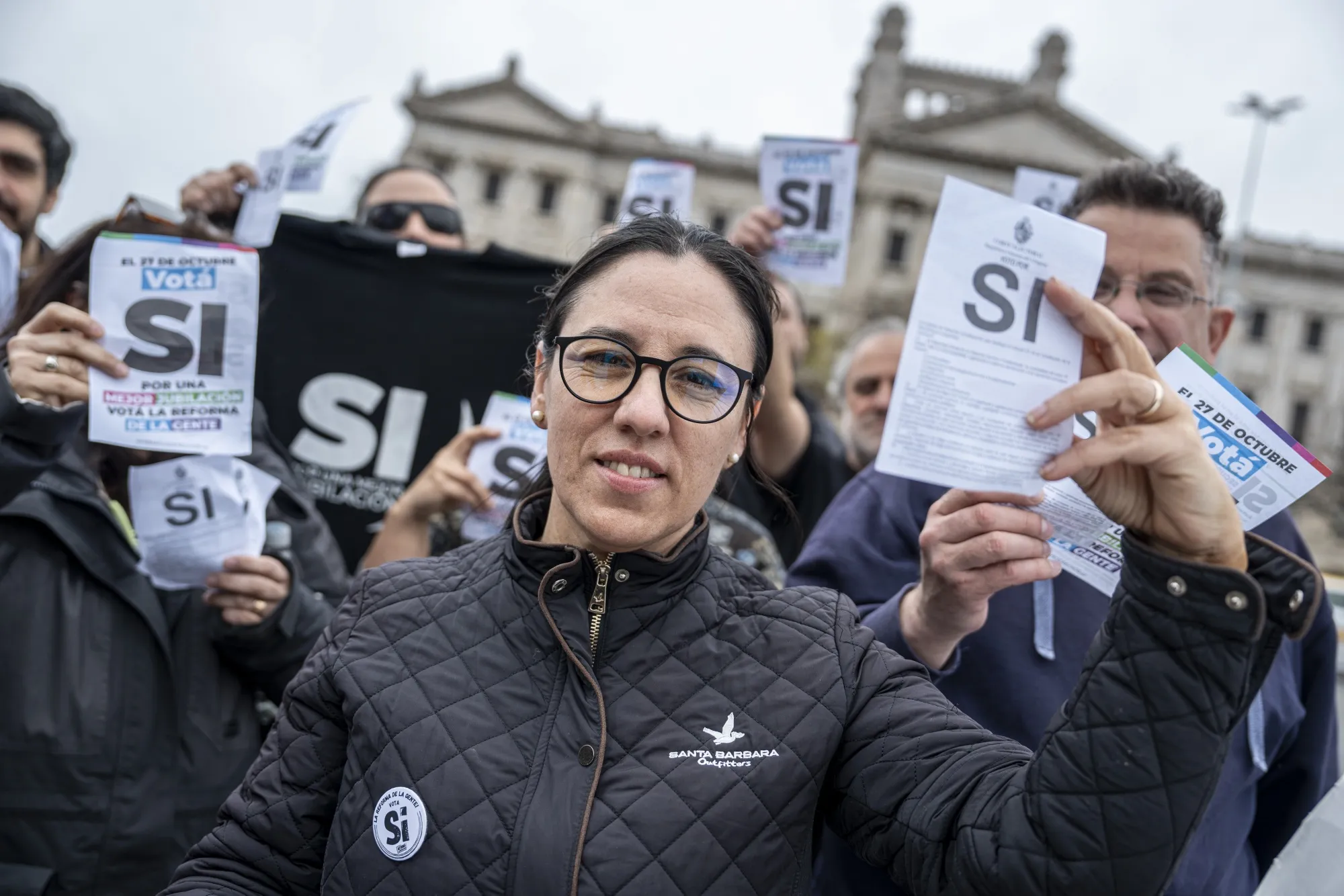 Union leader Karina Sosa campaigns in support of proposed changes to Uruguay’s pension system outside the legislature in Montevideo on Oct. 13.