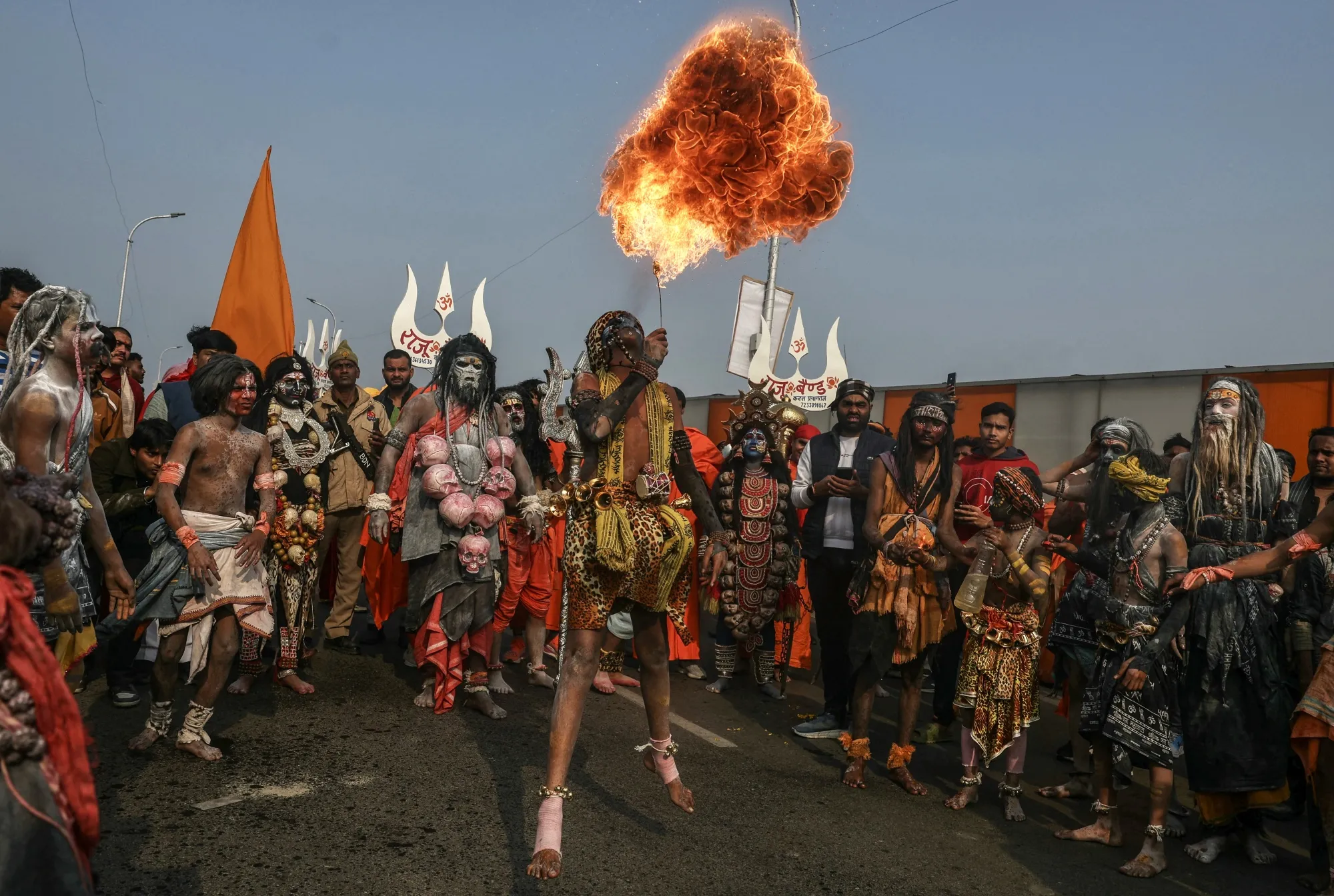 A Hindu devotee performs fire-breathing act during a religious procession ahead of the Maha Kumbh Mela festival in Prayagraj on Jan. 10.