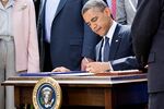 President Obama signs the Jumpstart Our Business Startups (JOBS) Act at the White House on April 5, 2012