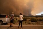 Evacuated residents watch the Tamarack Fire near Markleeville, California, on&nbsp;July 17.&nbsp;