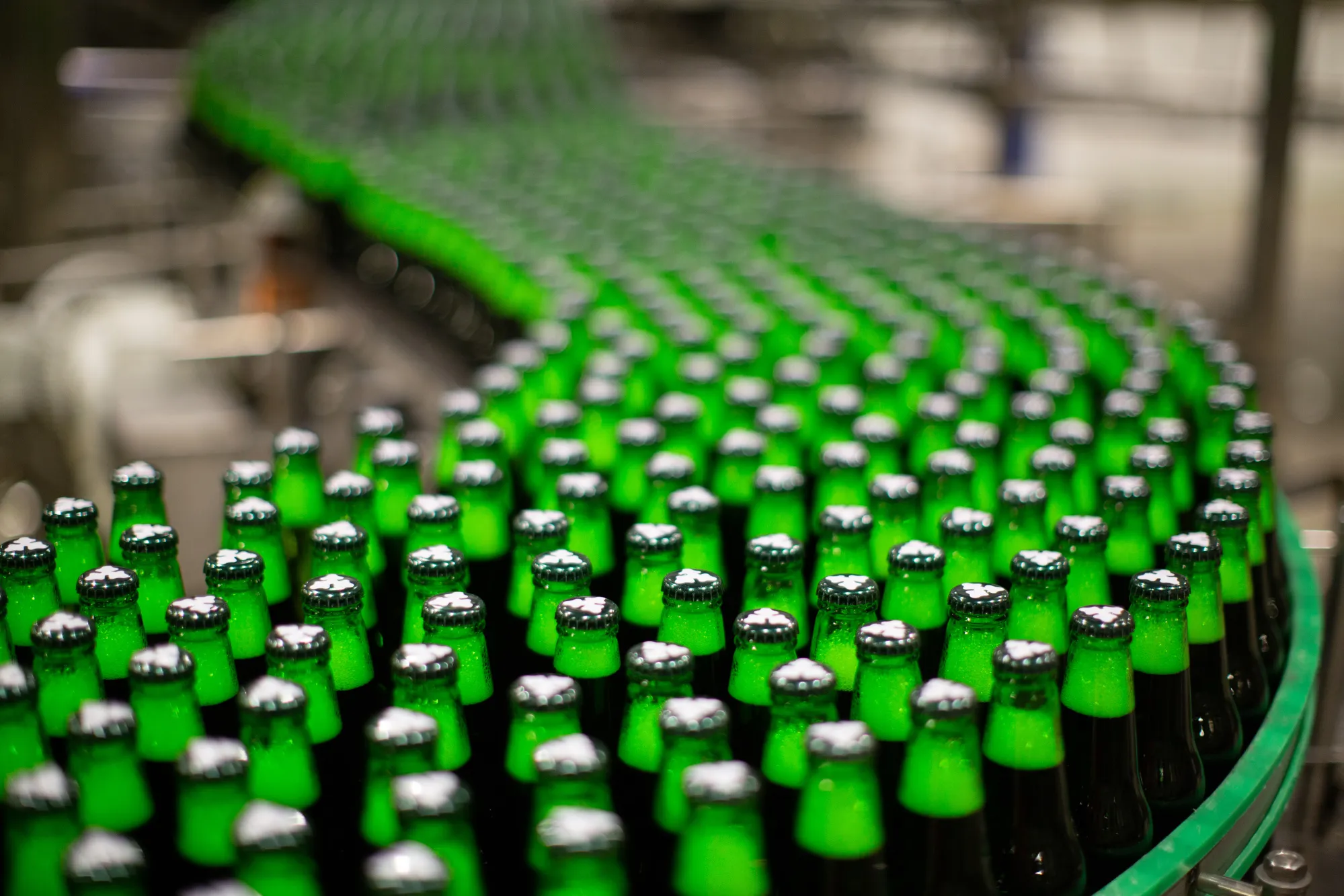 Bottles of Carlsberg beer on the production line at the Baltika Breweries plant in Saint Petersburg.