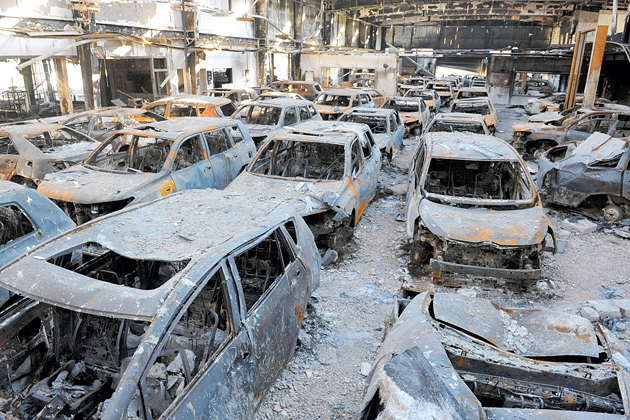 Burned cars at a Toyota dealership after they were set on fire by anti-Japan protesters in Qingdao, China, in November 2012
