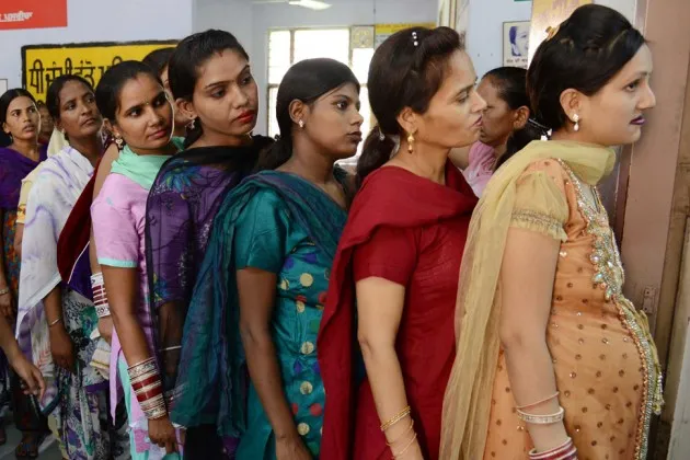 Women wait for check-ups at a hospital in Amritsar, India