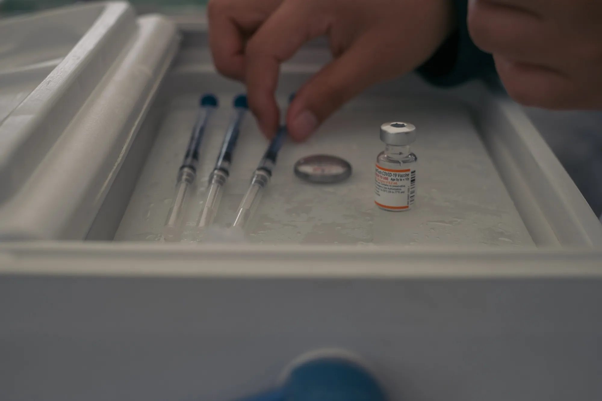 A healthcare worker prepares a dose of the Pfizer-BioNTech Covid-19 vaccine.