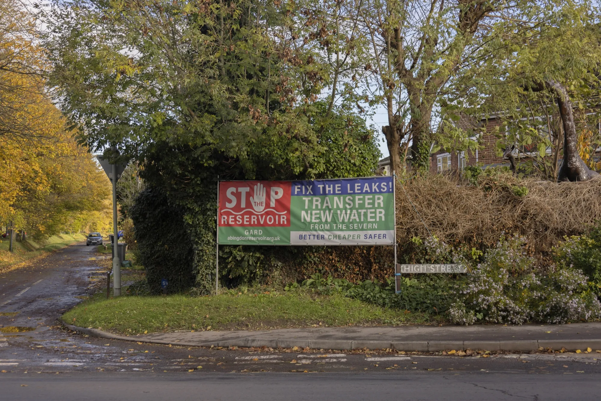 A banner displayed outside Steventon Village Hall calls for a halt to the reservoir project near Abingdon, Oxfordshire, UK, on Nov. 15,