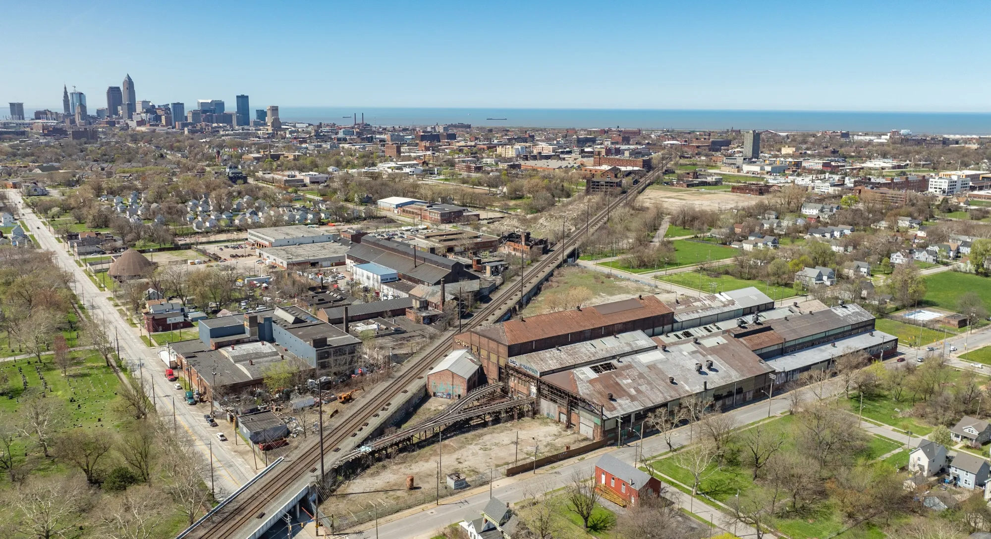 Abandoned industrial sites line the freight rail tracks running through Cleveland’s East Side. A new city initiative aims to get this strip of land ready for new tenants.