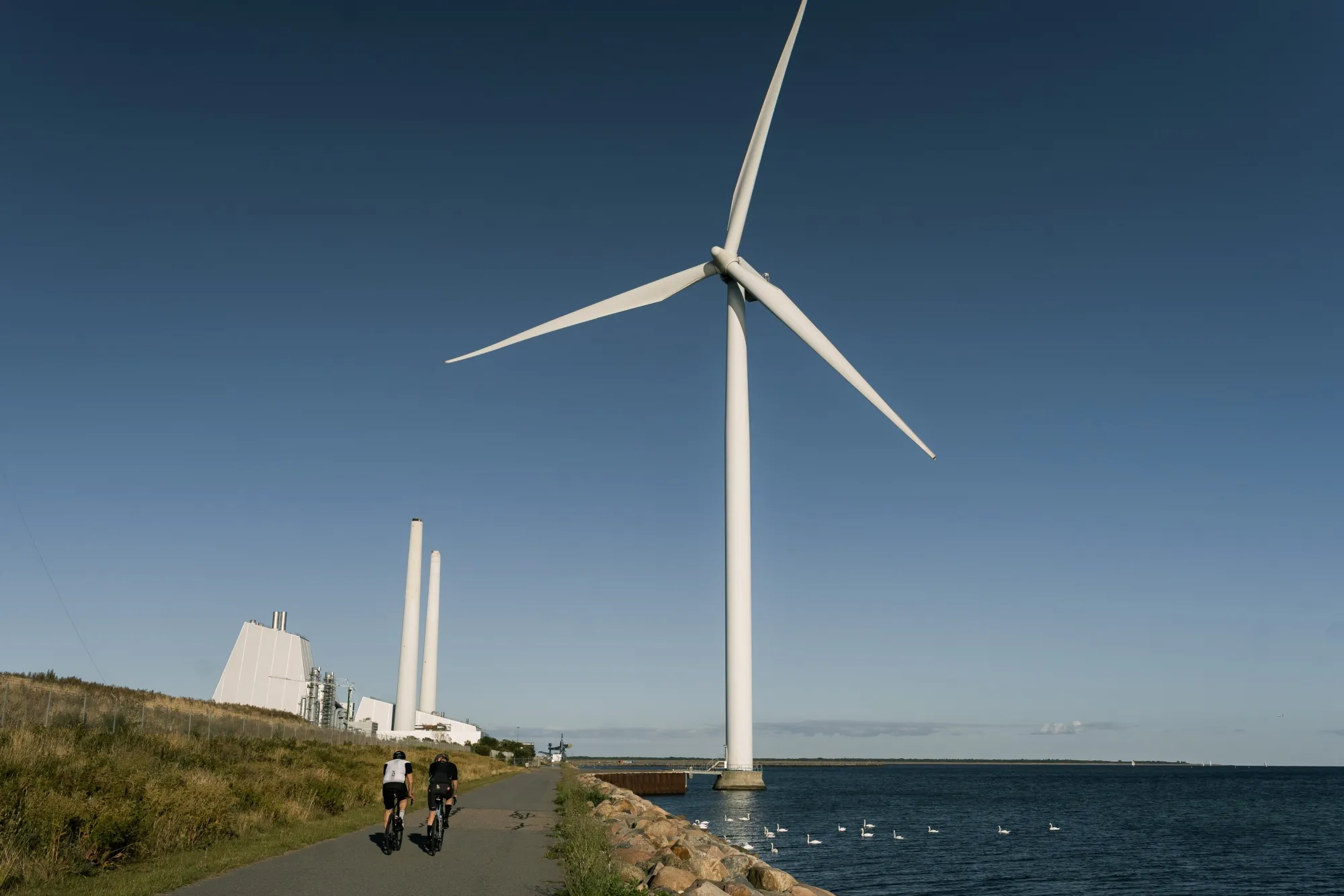 A wind turbine near the Avedore power station, operated by Orsted A/S, near Copenhagen, Denmark.