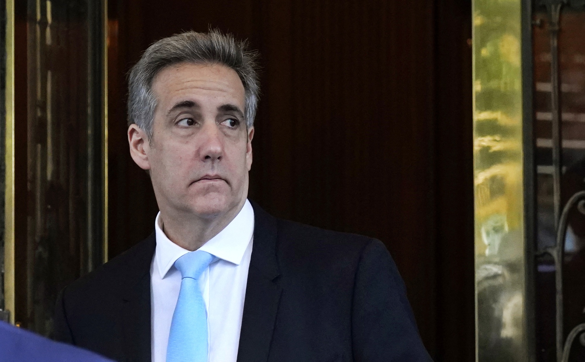 Michael Cohen leaves for Manhattan Criminal Court in New York on May 14.