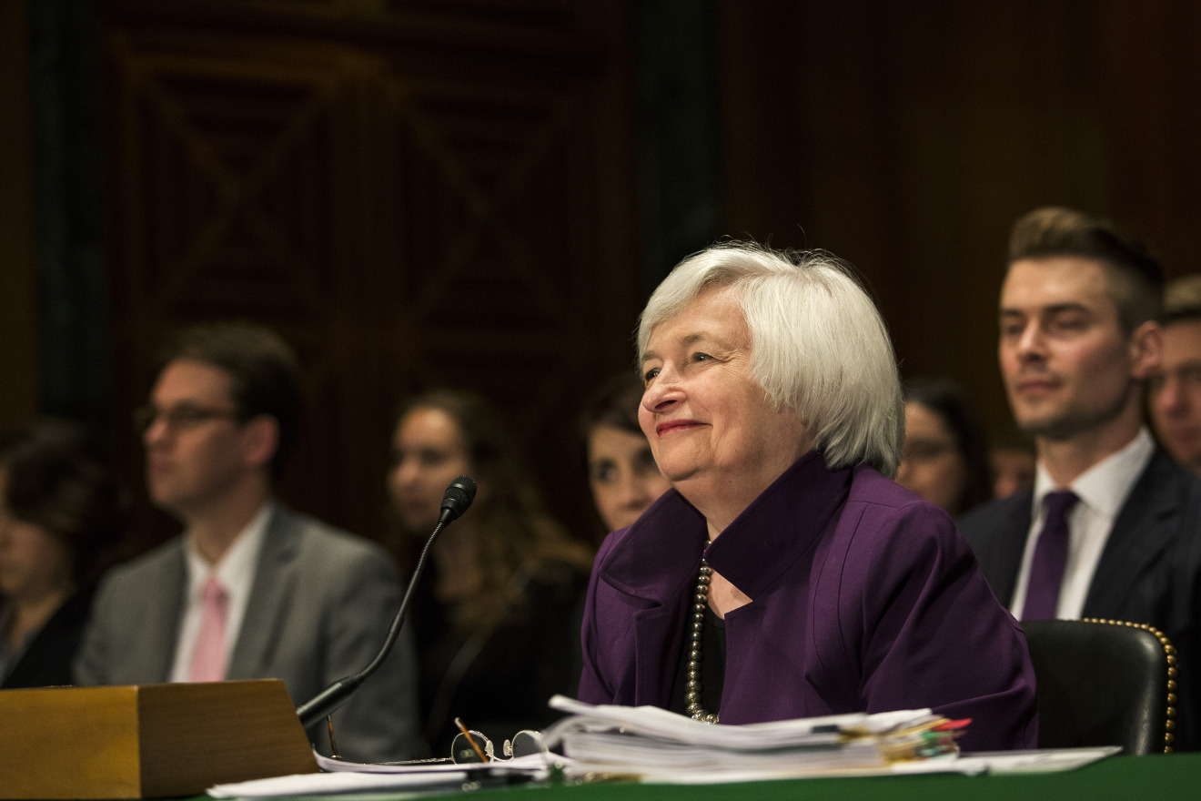Janet Yellen, chair of the U.S. Federal Reserve, looks on at the start of her semiannual report on the economy to the Senate Banking Committee in Washington, D.C., U.S., on Thursday, July 16, 2015.
