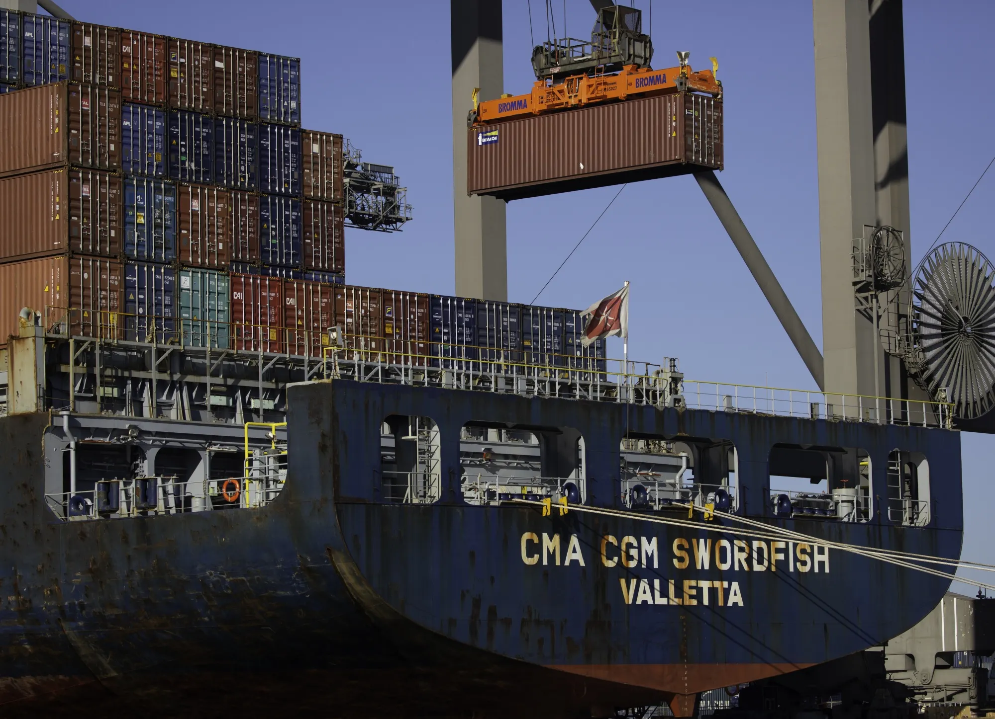 The CMA CGM Swordfish container ship is loaded at Pier 300 in the Port of Los Angeles in Los Angeles, Calif., on&nbsp;Nov. 21.&nbsp;