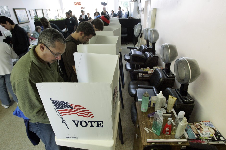Voters cast ballots the old-fashioned way in a hair salon in Los Angeles.