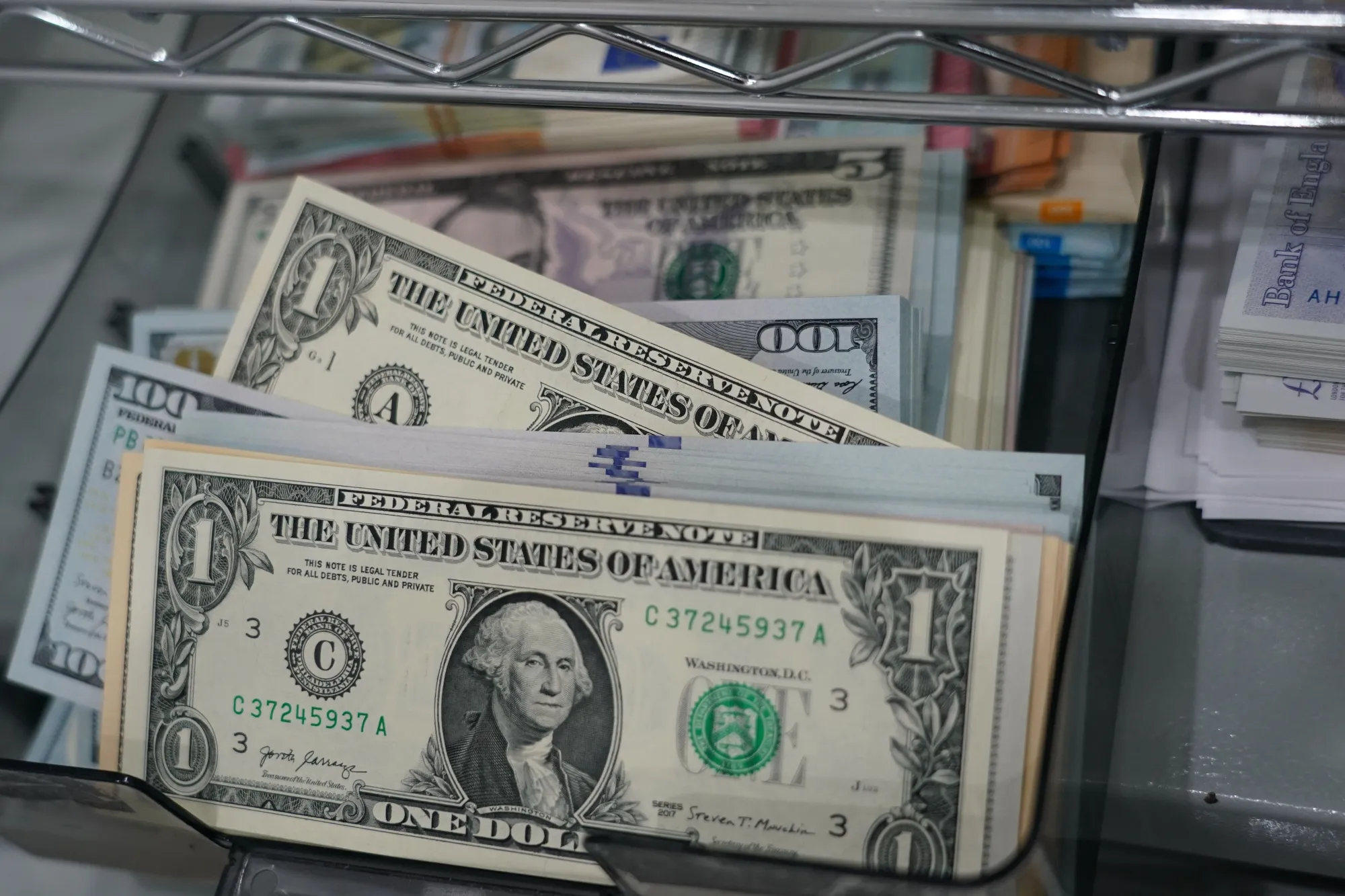 US dollar&nbsp;banknotes at the Ninja Money Exchange, operated by Interbank HD, in the Shinjuku district of Tokyo, Japan.