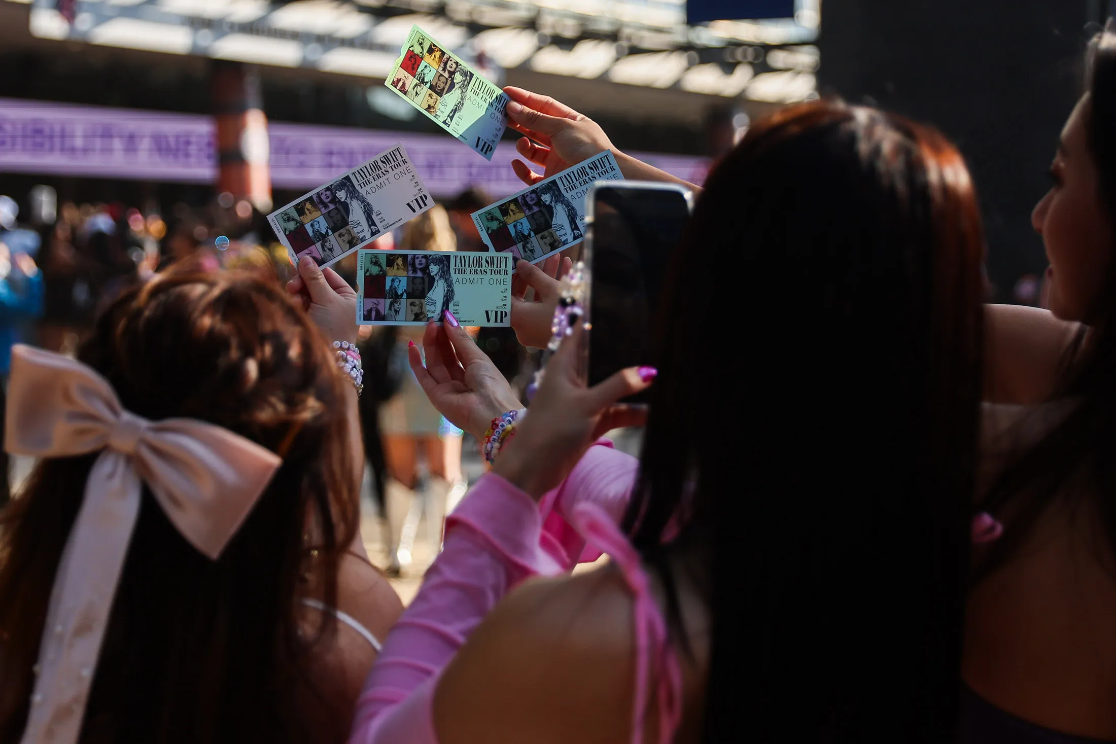 Taylor Swift fans, also known as “Swifties”, hold up tickets purchased for the show at Melbourne Cricket Ground on February 16, 2024 in Melbourne, Australia.