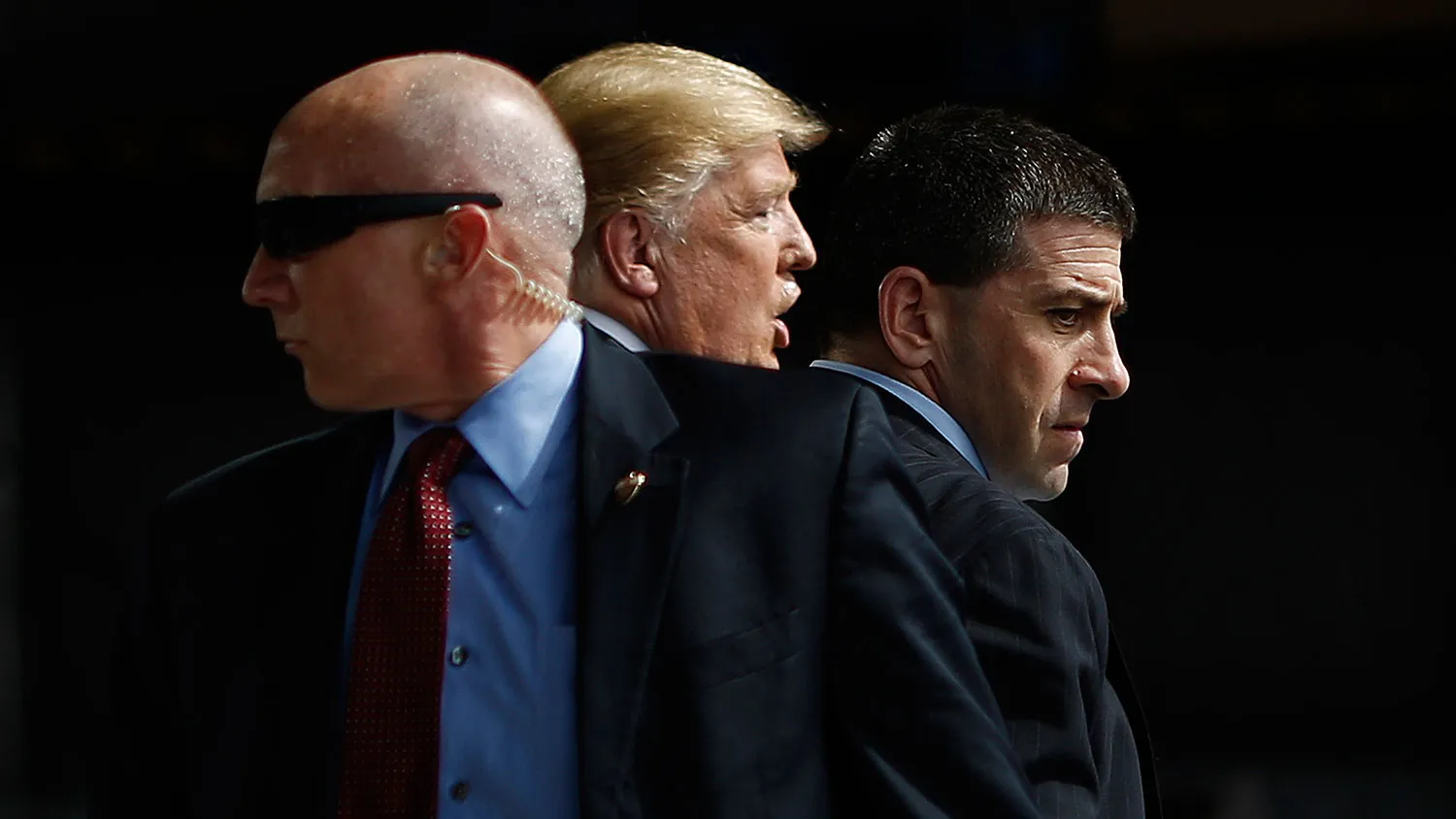 U.S. Secret Service agents surround Donald Trump during a campaign event in Dayton, Ohio, on March 12, 2016.
