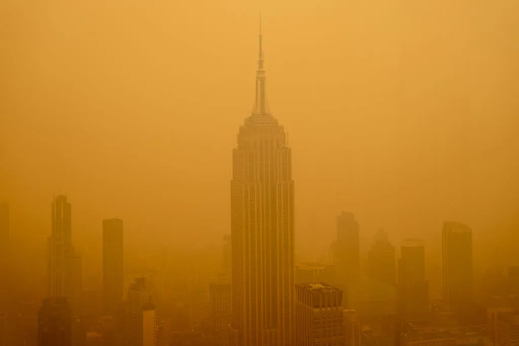 Haze from wildfires in Canada diminishes the visibility of the Empire State Building on June 7, 2023 in New York City.&nbsp;