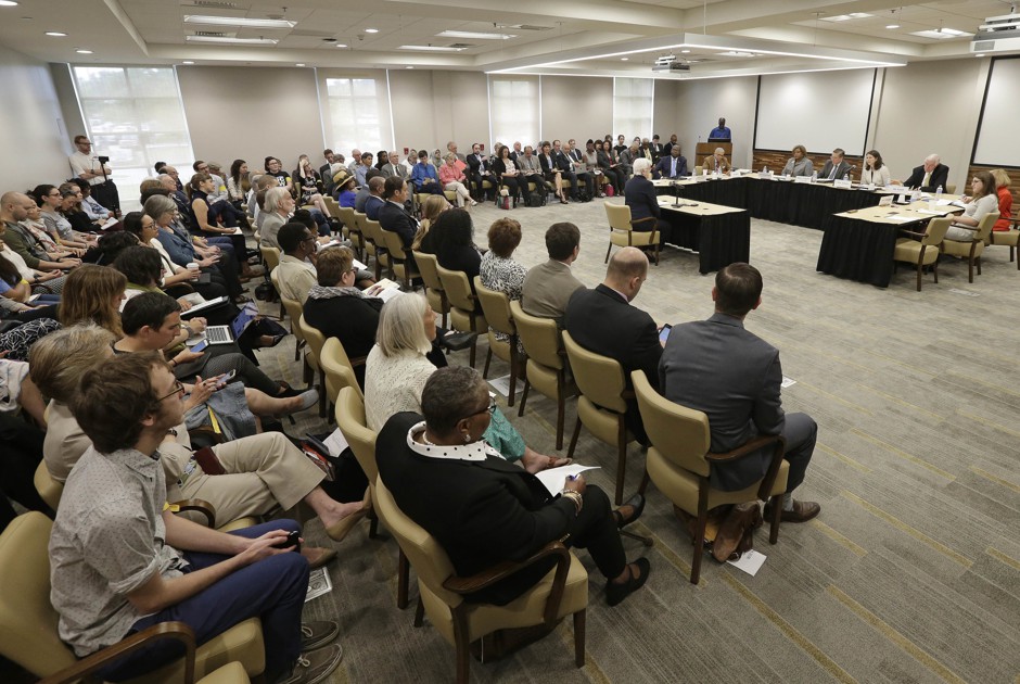 A crowded room at a public forum at the University of North Carolina at Chapel Hill, the country's first public university.