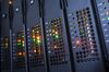 Colored lights indicate the operation of supercalculator Blade units on a Bullx B700 computer rack during testing at the Bull SA headquarters in Angers, France, on Monday, June 23, 2014. Thierry Breton, chief executive officer of software maker Atos, is engineering a 620 million-euro ($846 million) bid to acquire Bull, the company he tried to revive two decades ago.