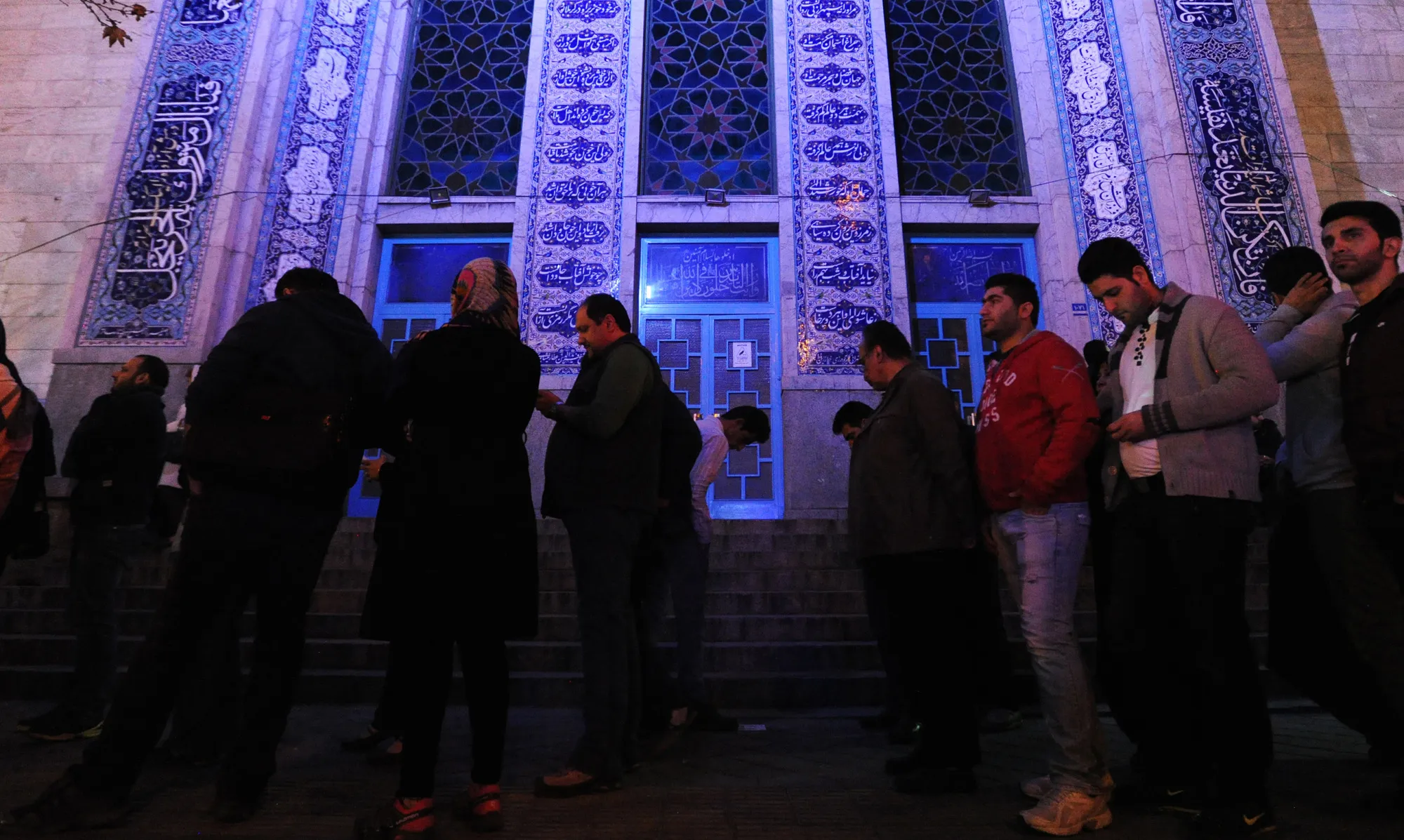 Iranians stand in line to vote outside the Hosseiniyeh Ershad mosque in Tehran, on Feb. 26.

